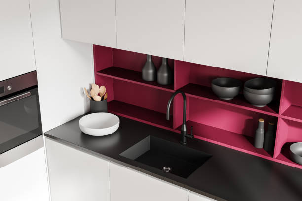 istock Modern kitchen interior with black faucet and pink shelves, white cabinets, and decor elements. 3D Rendering 2190204249