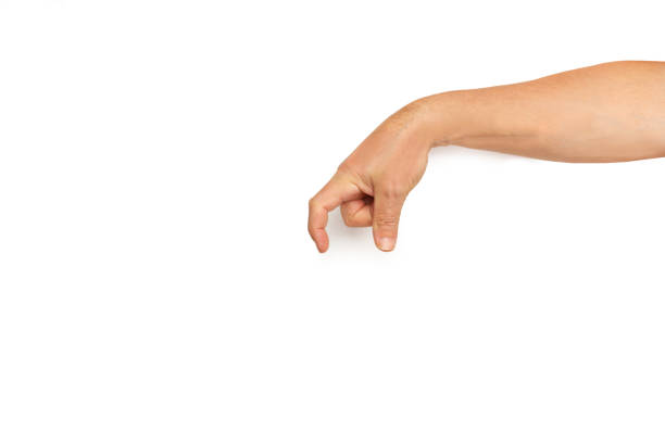istock Man hand with gesture of holding something small on a white background with copy space 2190206340