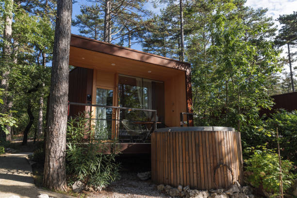 istock Glamping hut and hot tub in forest 2190206568