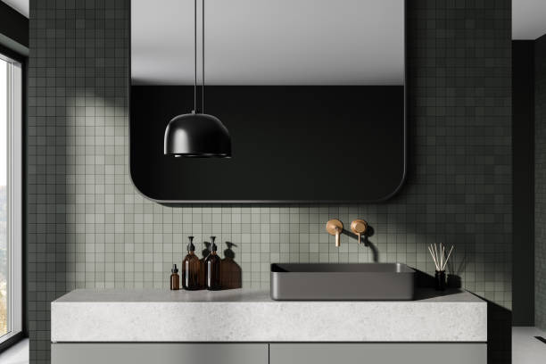 istock Modern bathroom sink with black basin, green tiles, and pendant light, minimalistic design concept. 3D Rendering 2190206573