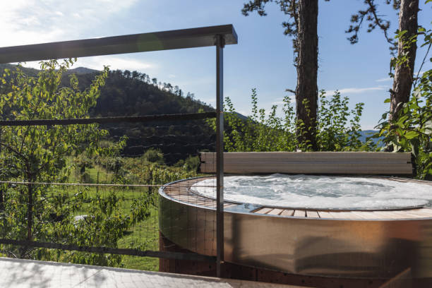 istock Glamping hut and hot tub in forest 2190206627