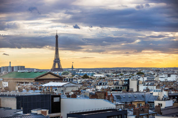 istock Paris cityscape and the Eiffel Tower under the moody sky at sunset 2190210497