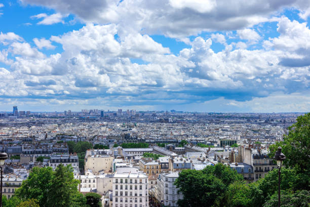 istock Paris cityscape aerial view, beautiful white clouds in blue sky 2190210613