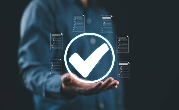 istock hand show checkmark task audit in a list of documents, tick process order. checklist concept, documents survey item, detail business verify task, tick mark evaluation in options check form online 2190210999