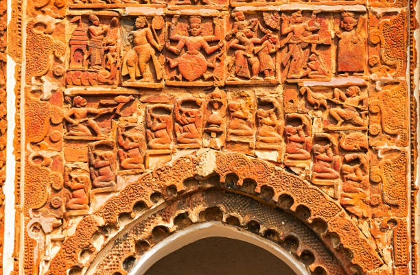 istock Lower panel carvings featuring Dashavatara and musicians on the facades of Radha Binod Temple, Joydev Kenduli, Birbhum, West Bengal, India. 2190211221