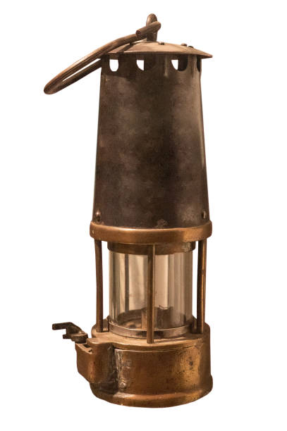 istock ancient miner's lamp safety lamp on white isolated 2190212068