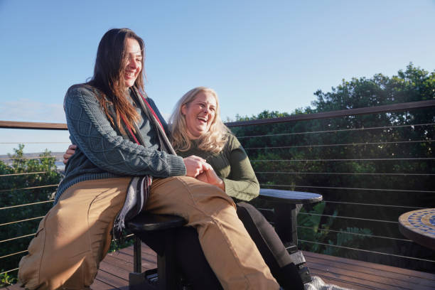 istock Lesbian couple relaxing on terrace 2190213578