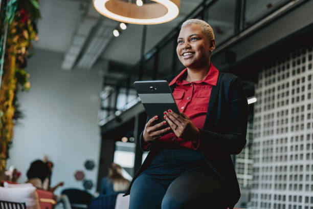 istock Business woman holding digital tablet 2190213827