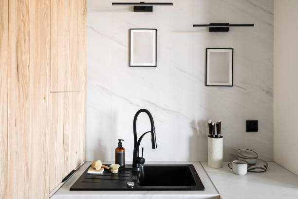 istock Modern black sink and faucet in stylish kitchen interior design 2190216038