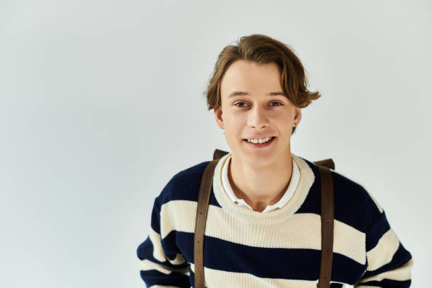 istock Young man embodies modern youth culture in stylish studio setting 2190223207