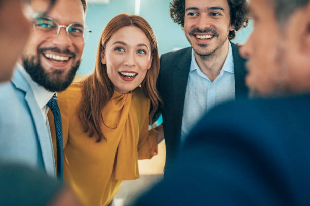 istock Cheerful team in the office 2190225256