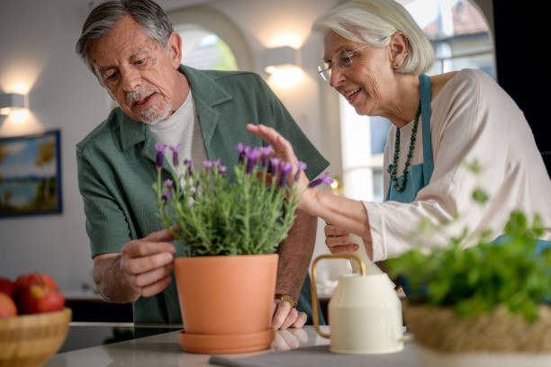 istock Elderly Couple Tending to a Lavender Plant 2190227112