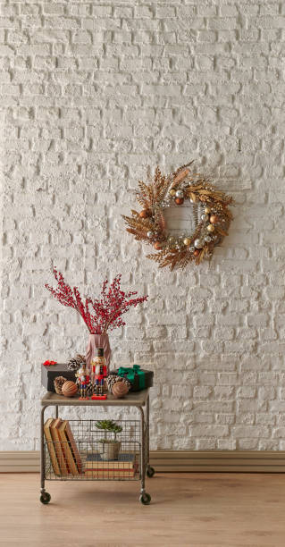 istock White brick wall background, Christmas tree, grey drawer, hung ornament style interior style. 2190227531