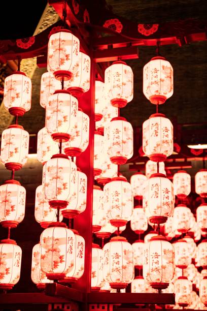 istock Traditional Asian lanterns glowing at night. 2190227696