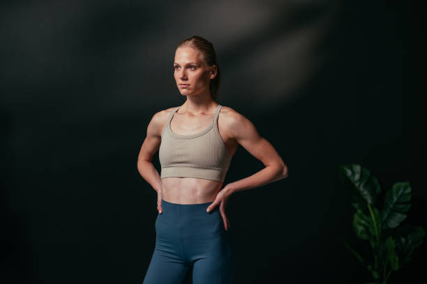 istock Determined female athlete posing confidently after intense workout session 2190228601