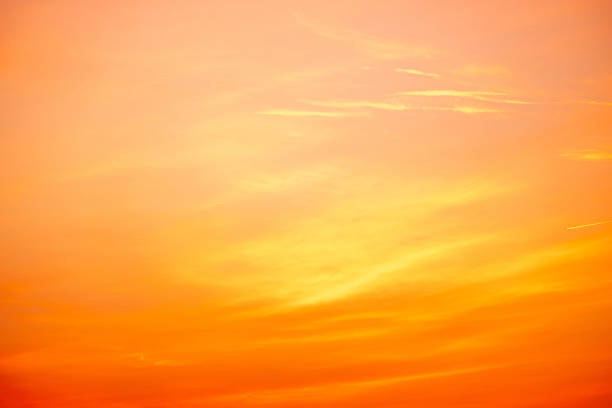 istock Sky,sunset, beautiful , luxury soft gradient orange gold clouds and sunlight on the blue sky perfect for the background, Sunrise on morning or everning in winter warm time ,Twilight summer,silhouette 2190231737