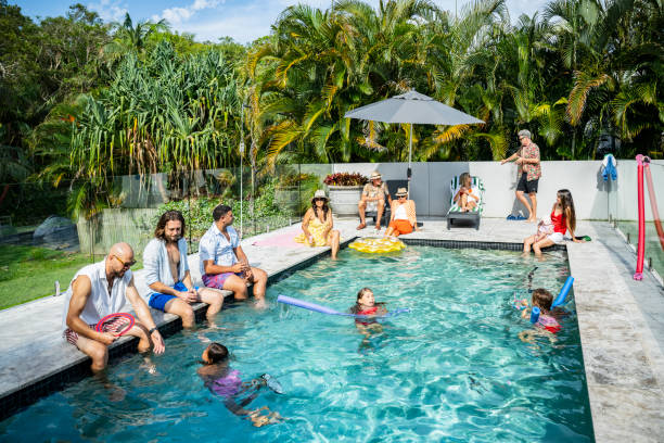 istock Multi-generation Byron Bay family enjoying sunny pool party 2190233712