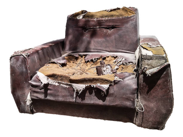 istock Old damaged abandoned sofa isolated photo 2190237386