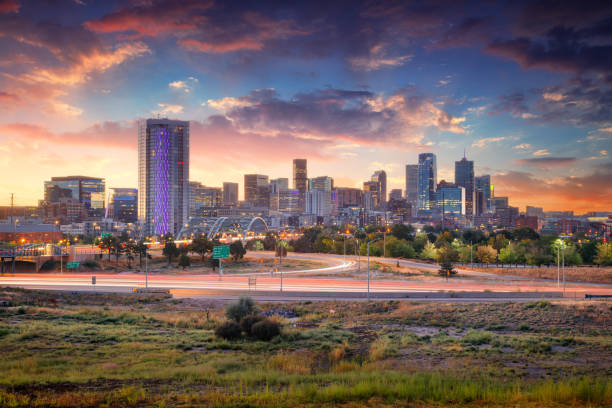 Cityscape image of Denver skyline, Colorado, USA at dramatic summer sunrise.