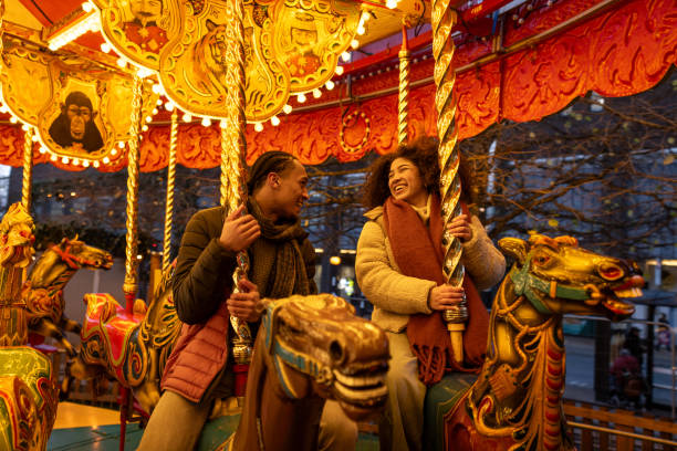 istock Couple Riding Carousel at Christmas Markets 2190240795