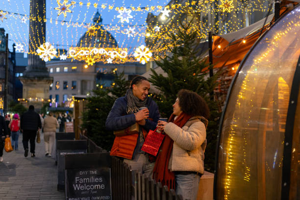 istock Couple at the Christmas Markets on a Winter’s Night 2190240853