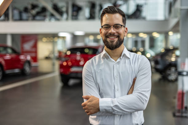 istock Professional advisor in a modern car showroom 2190241623