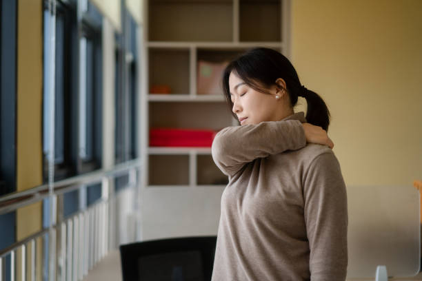 istock asian woman suffering from shoulder pain 2190241681