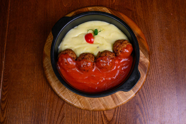 Meatballs in tomato sauce and mashed potatoes