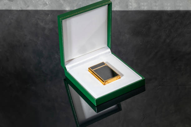 istock High quality lighter in a box on a dark background. Office interior. 2190244785