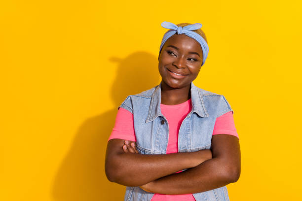 istock Portrait of funky satisfied person folded hands look interested empty space isolated on yellow color background 2190246281