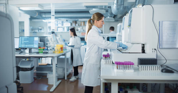 istock Diverse Team Working in a Clinical Laboratory. Biomedical Scientists Testing Out Clinical Specimens to Obtain Information About Patient Health to Aid in Diagnosis, Treatment and Prevention of Disease 2190247011