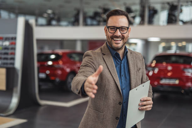istock The smile that sells dreams on four wheels 2190249337