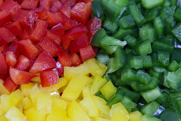 istock Red Green and Yellow Peppers 2190251877