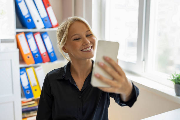 istock Young businesswoman taking a selfie 2190254582