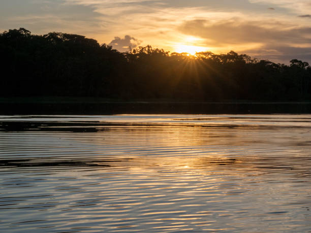 istock Sunset with beautiful reflections on the waters of the Amazon. 2190259153