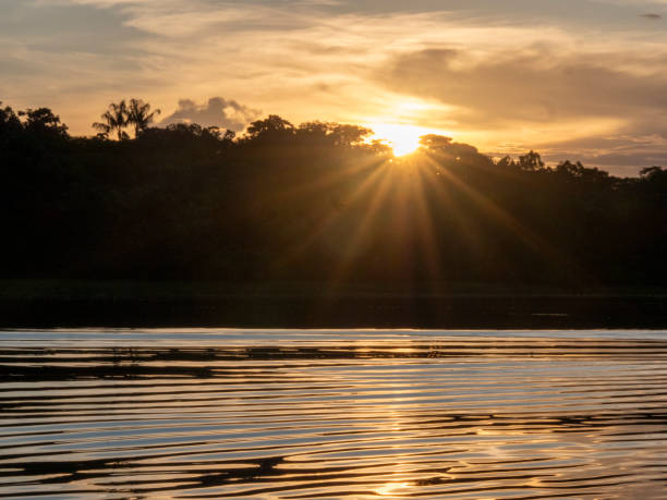 istock Sunset with beautiful reflections on the waters of the Amazon. 2190259171