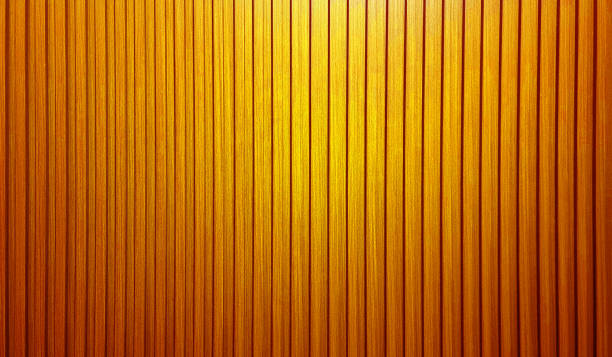 istock vertical wooden slats texture for interior decoration with light from above. 2190259217
