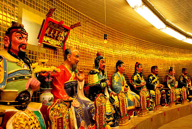 This is a photograph from September 2010 showing the inside of one of the rooms at the Yuen Yuen Institute filled with multiple religious statues. It is the only temple in Hong Kong that is dedicated to the three main Chinese religions: Taoism, Confucianism, and Buddhism.