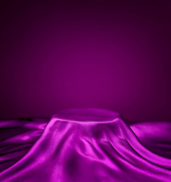 istock Violet silk clothing covered stage empty space backdrop. Luxury elegant background, podium background. Premium design platform.Product display. 2190259415