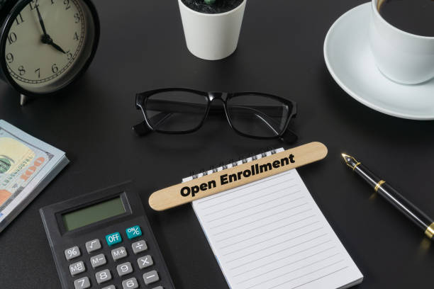 istock Business concept with a word Open Enrollment on black background 2190267296