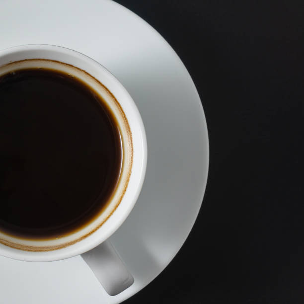 istock A cup of americano coffee on black background 2190267370