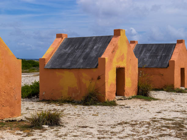 Multiple historic red slave hut sin Bonaire, Caribbean. High quality photo