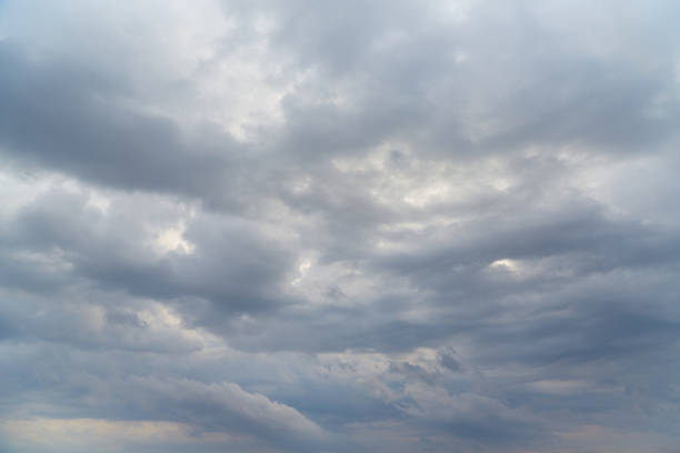 istock Cold and dreary winter sky with thick gray-white clouds. 2190283246
