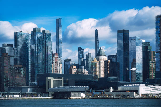 istock Modern New York Skyline With Skyscrapers and Riverfront Under Cloudy Sky 2190283336