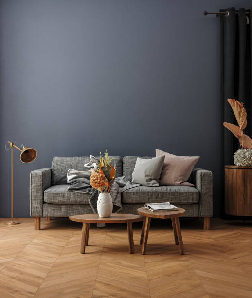 istock Simple minimalist cozy sofa with coffee table and decor in living room interior, home mockup 2190296771