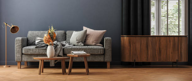 istock Simple minimalist cozy sofa with coffee table and decor in living room interior, home mockup 2190296775