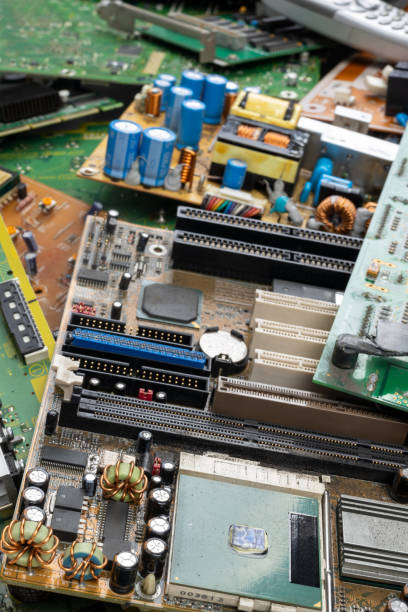 istock Discarded Circuit Boards Highlighting Electronic Waste and Overproduction 2190301010