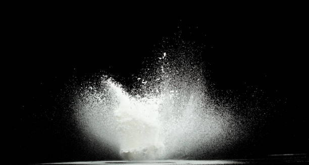 istock Tapioca starch flour fly explosion, White powder tapioca starch fall down in air. Seasoning flour powder is element material. Eyeshadow crush make up. Black background Isolated selective focus blur 2190302230