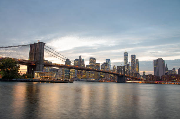 istock Sunset Over the Brooklyn Bridge, Capturing NYC’s Iconic Landmark in Golden Light 2190303239