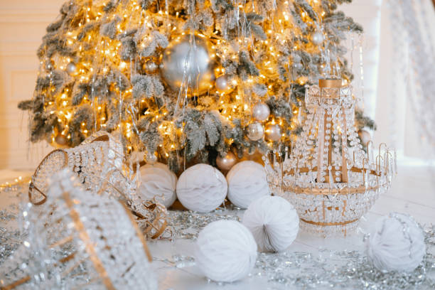 istock Elegant Christmas tree with shimmering decorations and gift boxes for 2025 2190305319